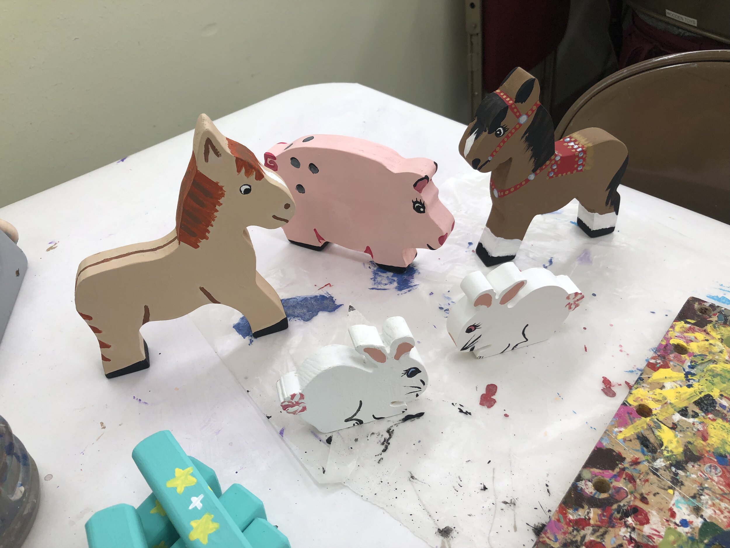 Mom and I started volunteering at the Idaho Fall Humanitarian Center, where we paint wooden toys.