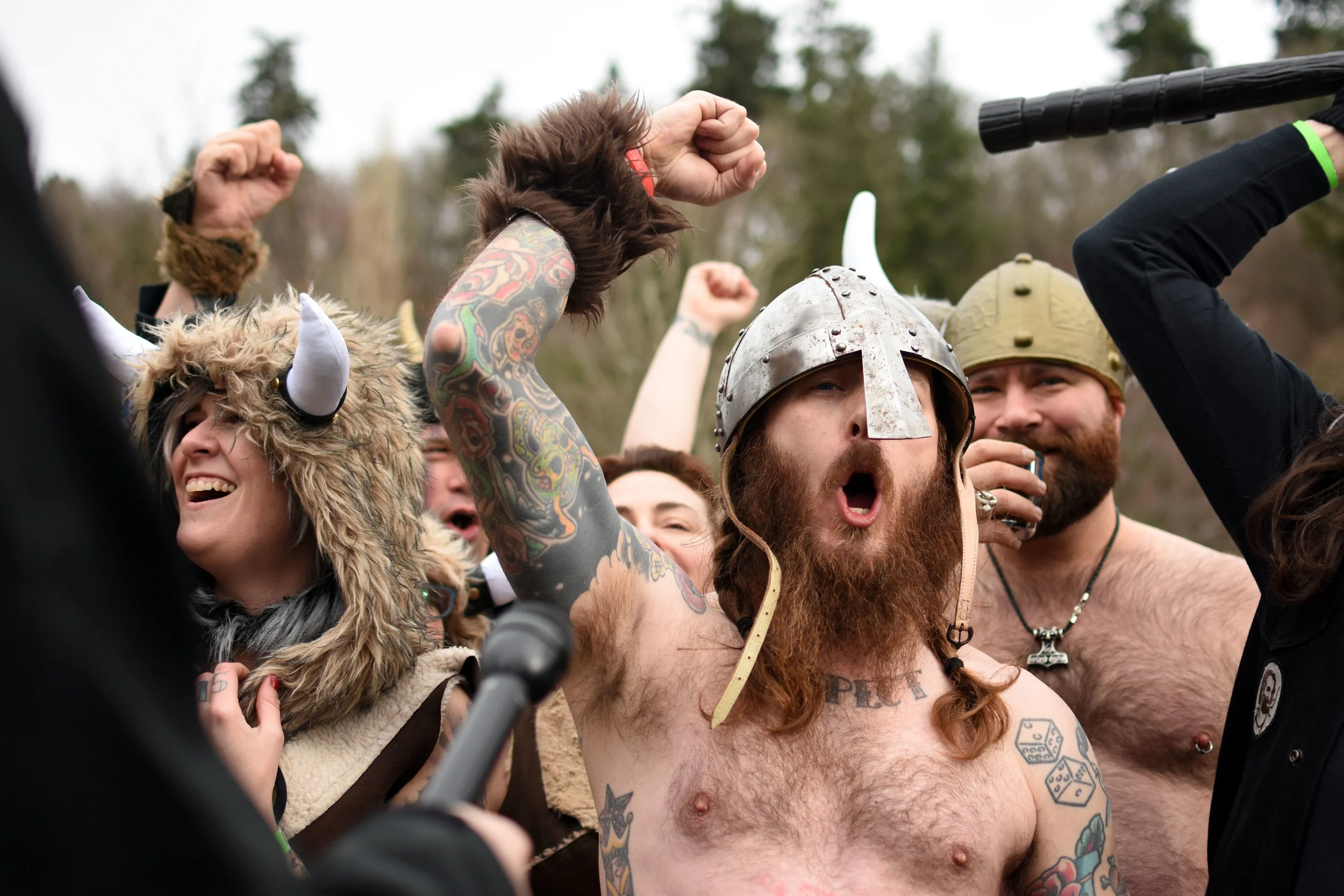  The hoard of Nearly Nekkid Vikings cheer after announcing the nearly $28,000 the group has raised for the Washington state Special Olympics on Feb. 6, 2016 at Golden Gardens Park in Seattle. 
