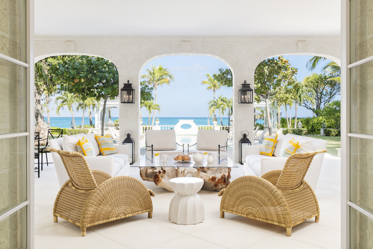 Interior Design Photography | Ocean-facing seating area at Coral Pavilion, Turks and Caicos. Design by Domino Creative.