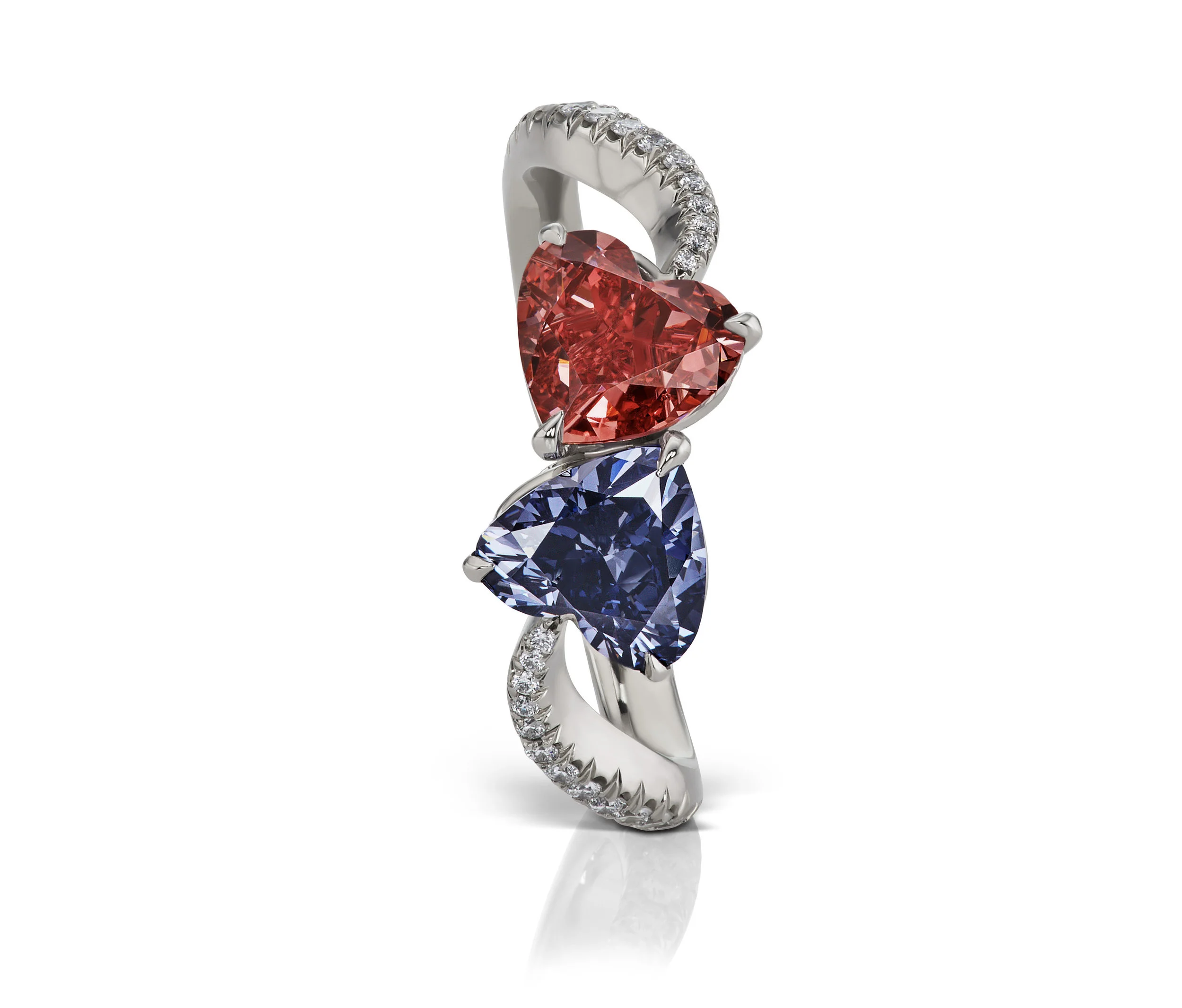 Twin Heart ring featuring a 0.75 carat fancy red SI2 (GIA) and 0.78 carat Fancy deep bluish violet. Designed by Scott West