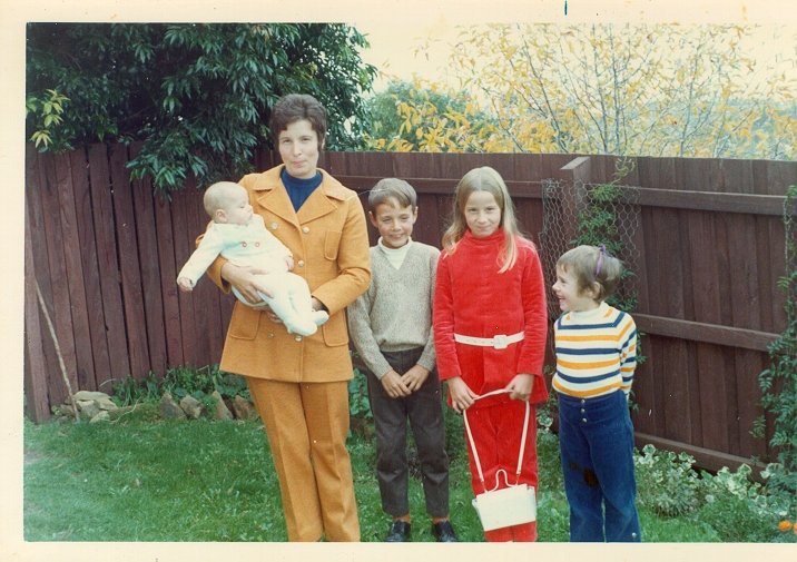 I felt very smart in my red pantsuit made by my very talented dressmaker mother.
