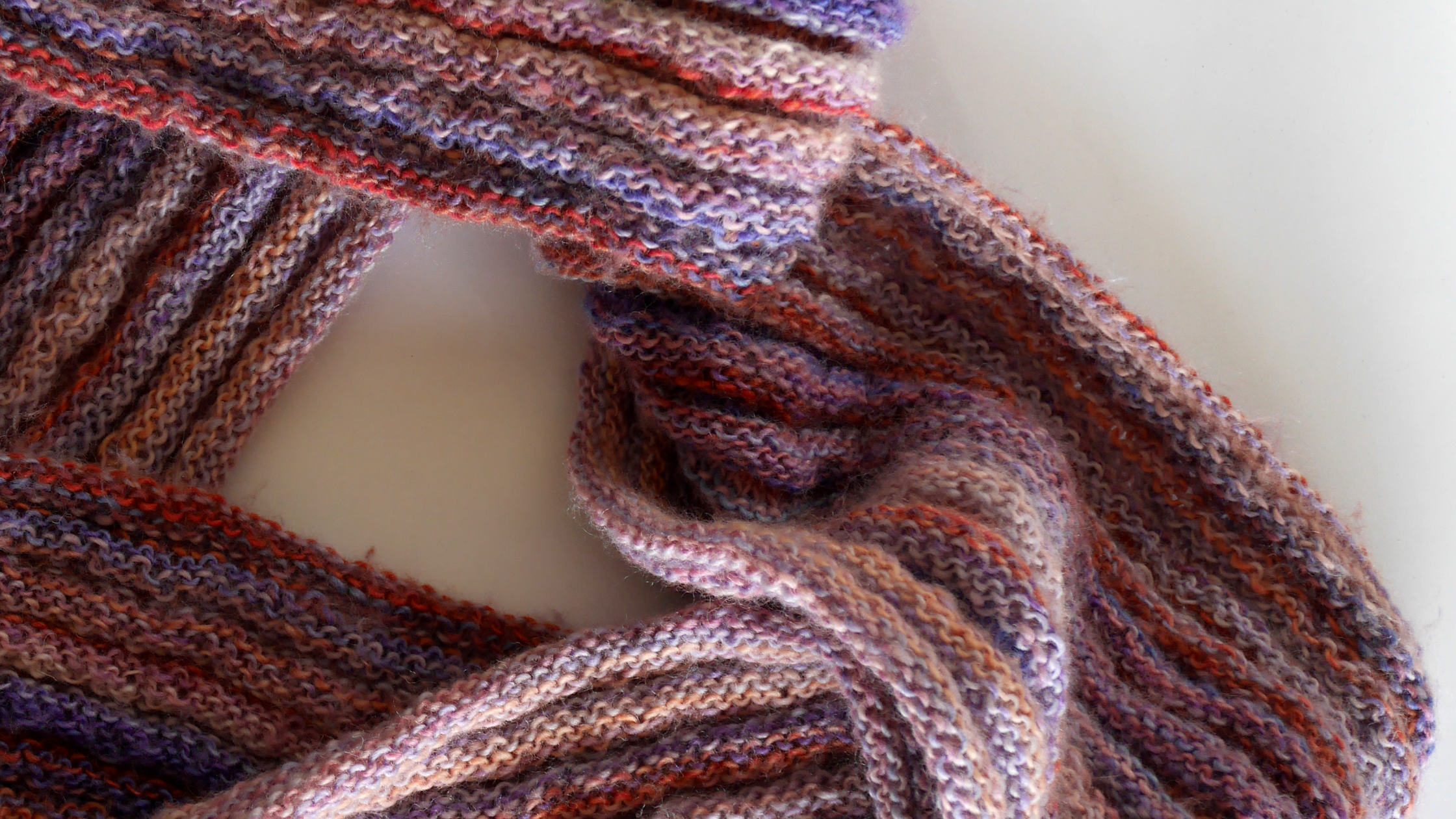 A hand knitted scarf by Talea.