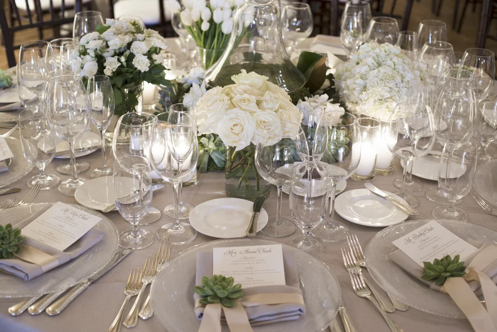 White, green and neutral wedding reception tabletop and centerpieces at The Resort at Pelican Hill - designed by Eddie Zaratsian Lifestyle and Design, Photo by John and Joseph Photography