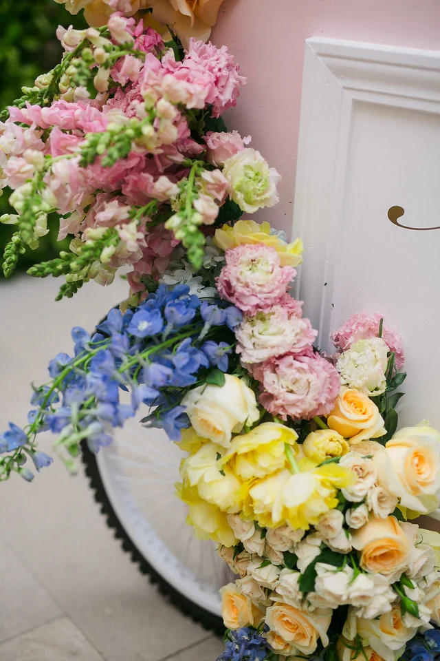 Spring butterfly themed baptism reception seating card display cart - floral design by Eddie Zaratsian