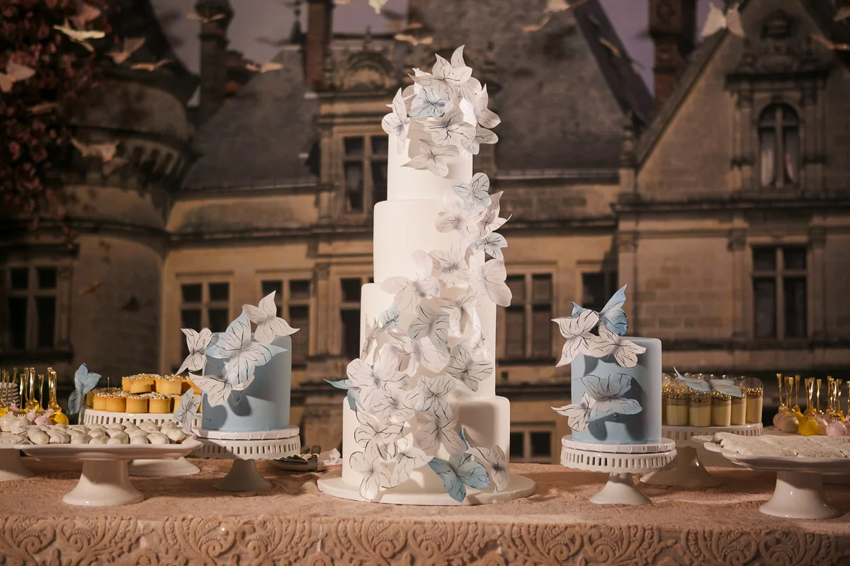 Spring butterfly themed baptism reception cake display - floral design by Eddie Zaratsian