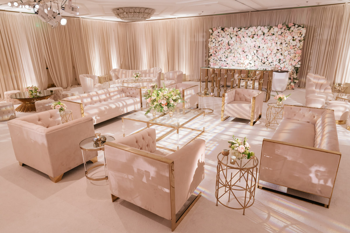 Modern pink, cream and copper wedding reception lounge area designed by Eddie Zaratsian, photo by Kris Kan
