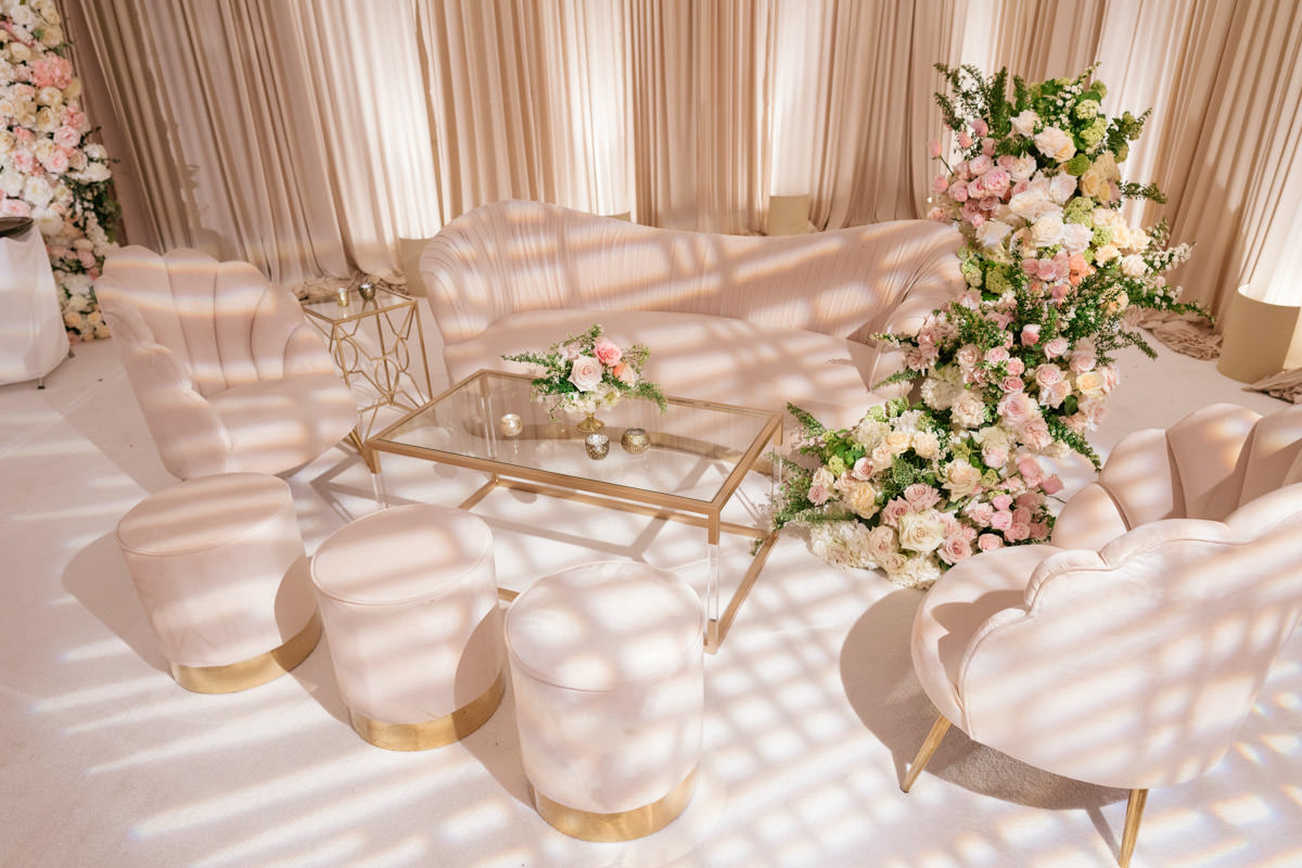 Modern pink, cream and copper wedding reception lounge area designed by Eddie Zaratsian, photo by Kris Kan
