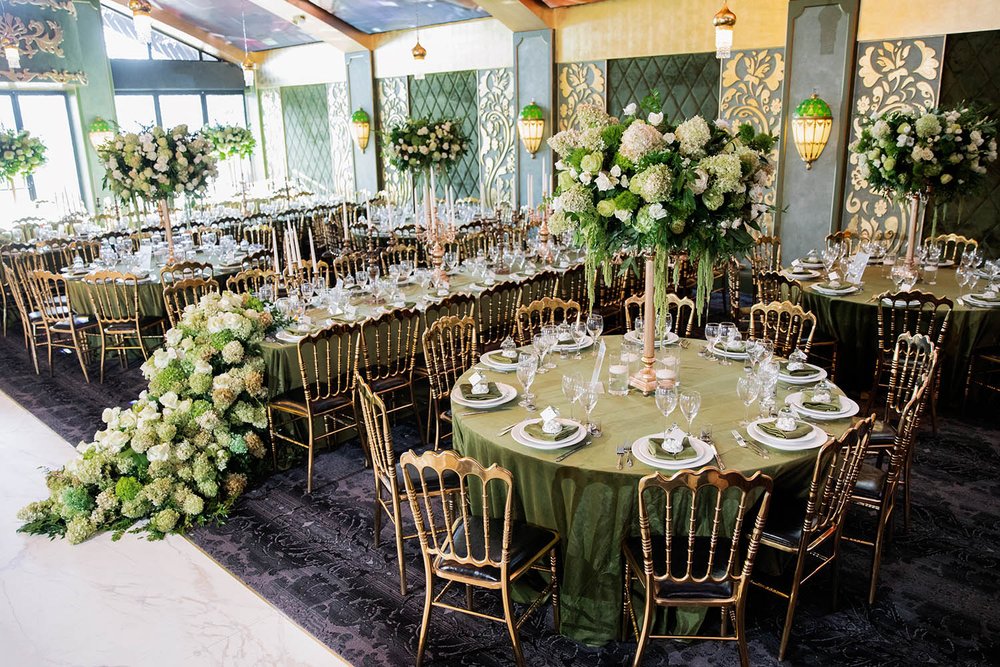 Los Angeles wedding reception at Diaghilev Restaurant, with green and white florals by Eddie Zaratsian