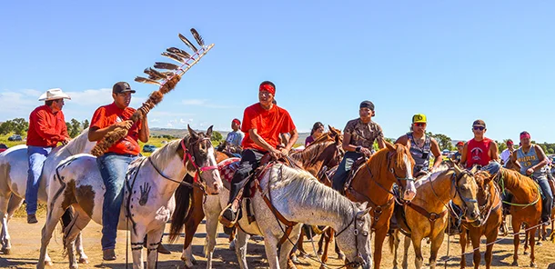 A rally led on horseback by the Standing Rock Sioux Nation and their allies. (Photo: Robert Wilson)