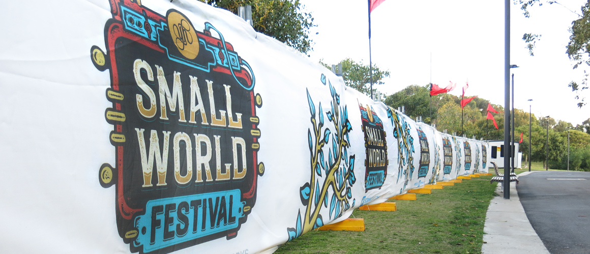 SCRIMWORKS_EXTERIOR_BANNER_MESH_SHADE_CLOTH_PRINTED_CONSTRUCTION_EVENTS_SIGNAGE_FENCING_SMALL_WORLD_FESTIVAL_1.jpg