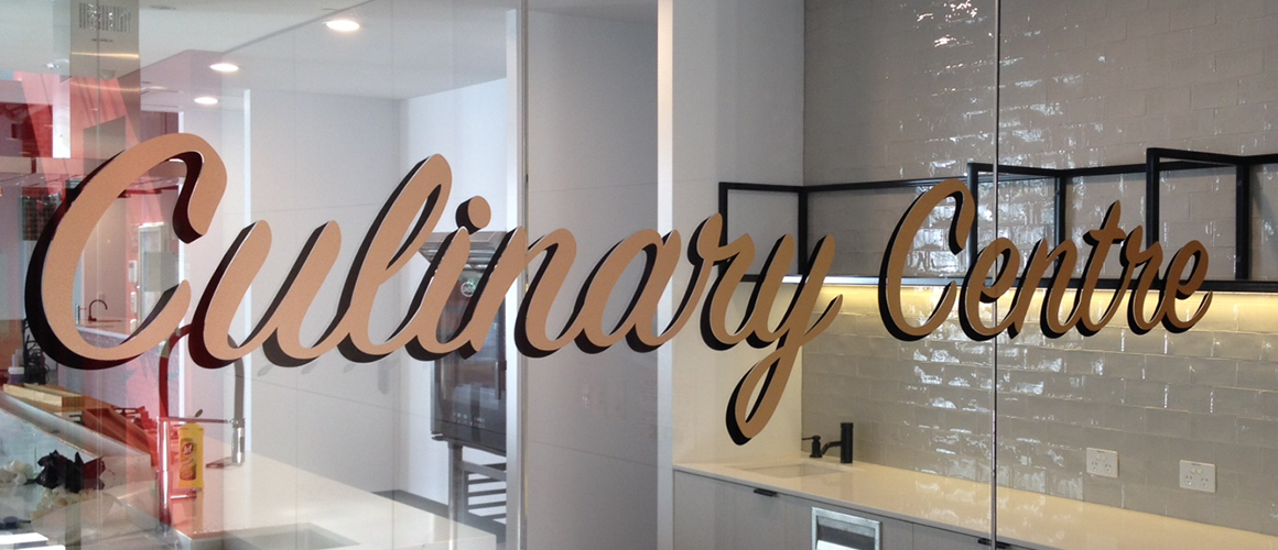 SCRIMWORKS_INTERIORS_WALL_GRAPHICS_MURAL_FROSTING_PRINTED_SIGNAGE_ARNOTTS_1.png