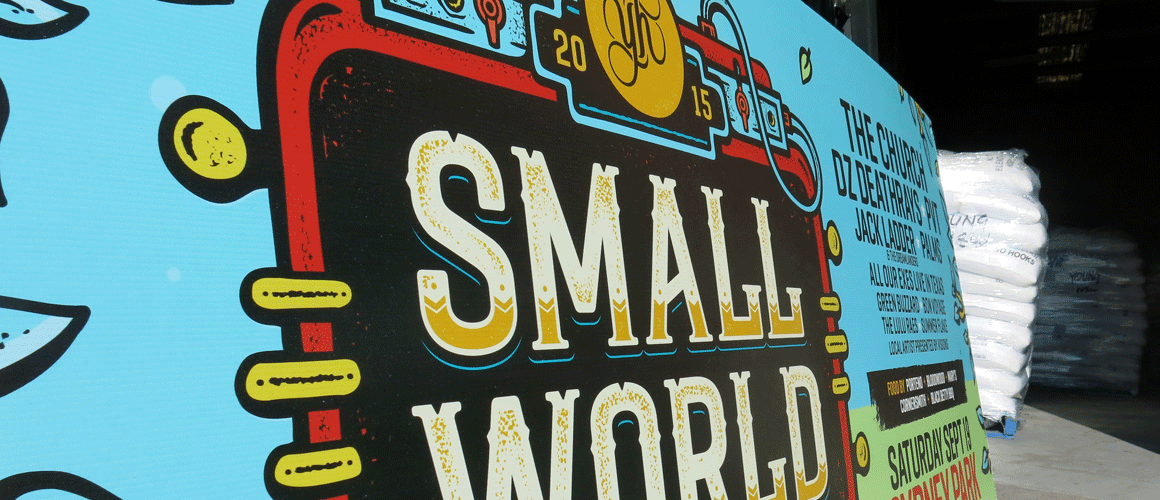 SCRIMWORKS_EXTERIOR_CORFLUTE_COREFLUTE_SIGNAGE_BANNER_MESH_SHADE_CLOTH_PRINTED_CONSTRUCTION_EVENTS_SIGNAGE_FENCING_SMALL_WORLD_FESTIVAL_2.png