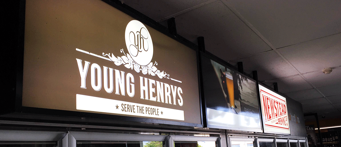 SCRIMWORKS_EXTERIOR_ACRYLIC_PERSPEX_SIGNAGE_BANNER_MESH_SHADE_CLOTH_PRINTED_CONSTRUCTION_EVENTS_SIGNAGE_FENCING_LIGHT_BOX_YOUNG_HENRYS.png