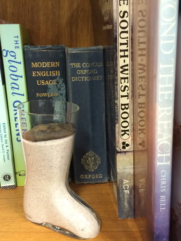 Jar of Lake Pedder sand and Pedder penny given to Christine Milne by Margaret Wilkinson.