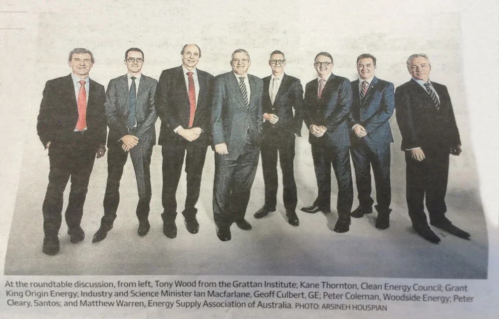 Newspaper photo demonstrating shocking gender imbalance in energy policy sector.