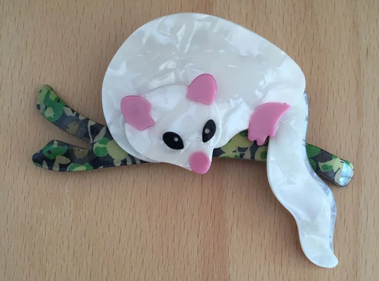 My white Lemuroid possum brooch designed by Lea Stein.