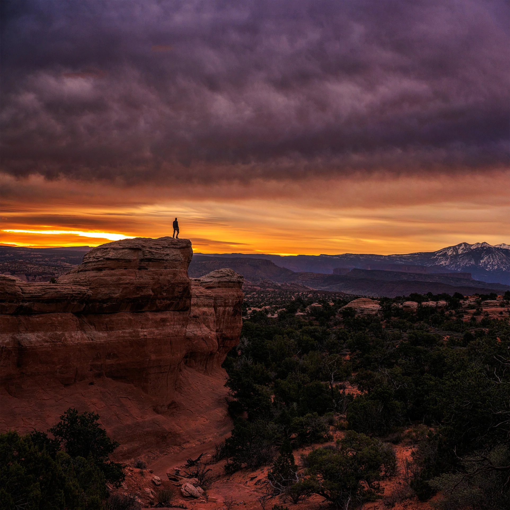Hiker Sunrise Arches Moab Utah