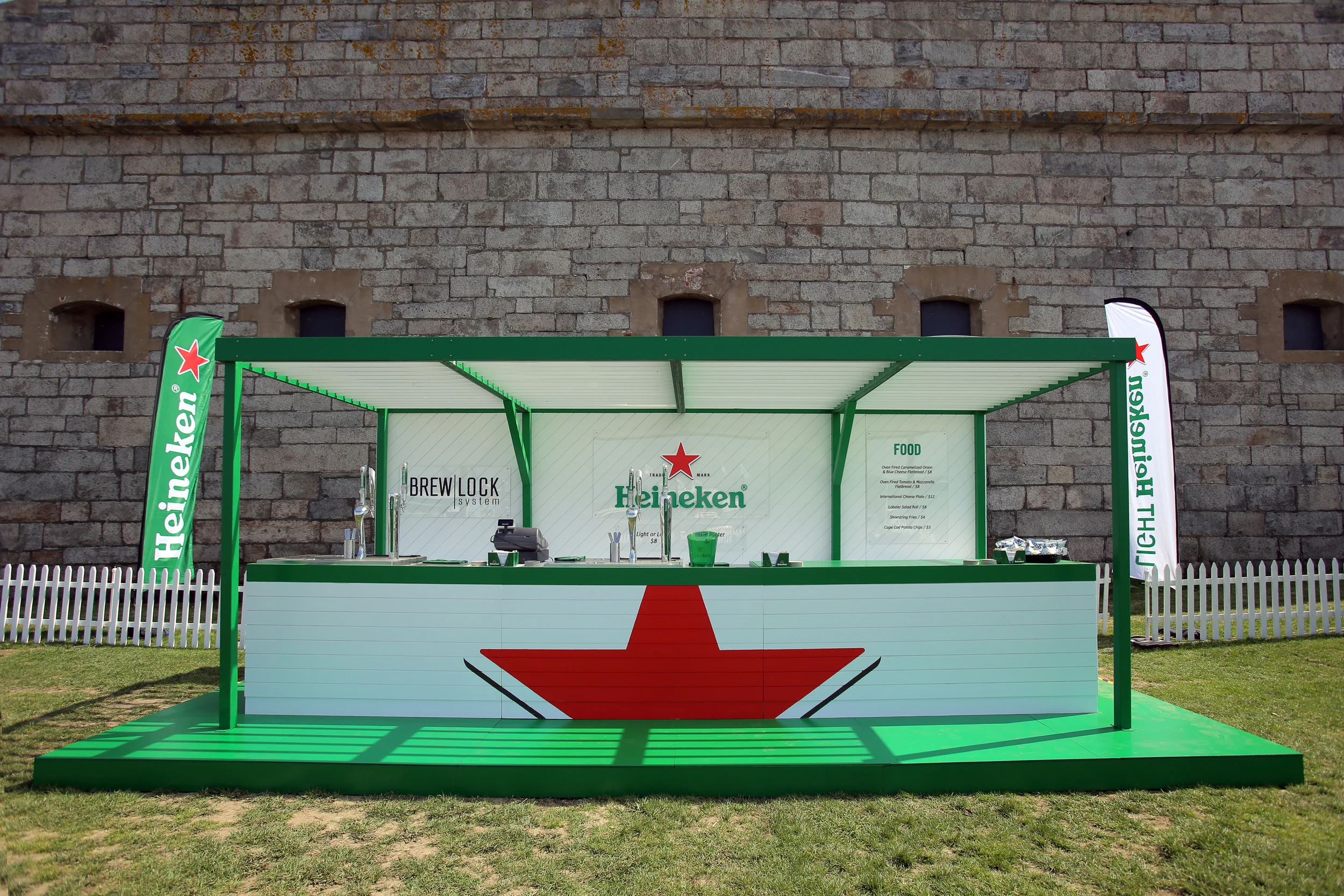 Outdoor pop-up bar with integrated tap systems at a multi-day sailing race .