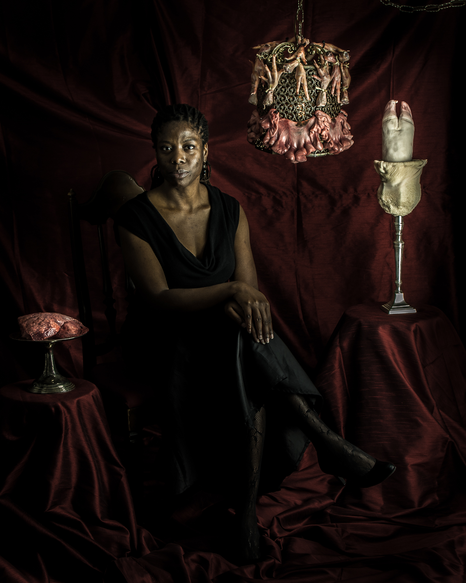 Another shot from our shoot. Me posing with cow lung, meat chandelier, and cow-foot candelabra bound in goat stomach.