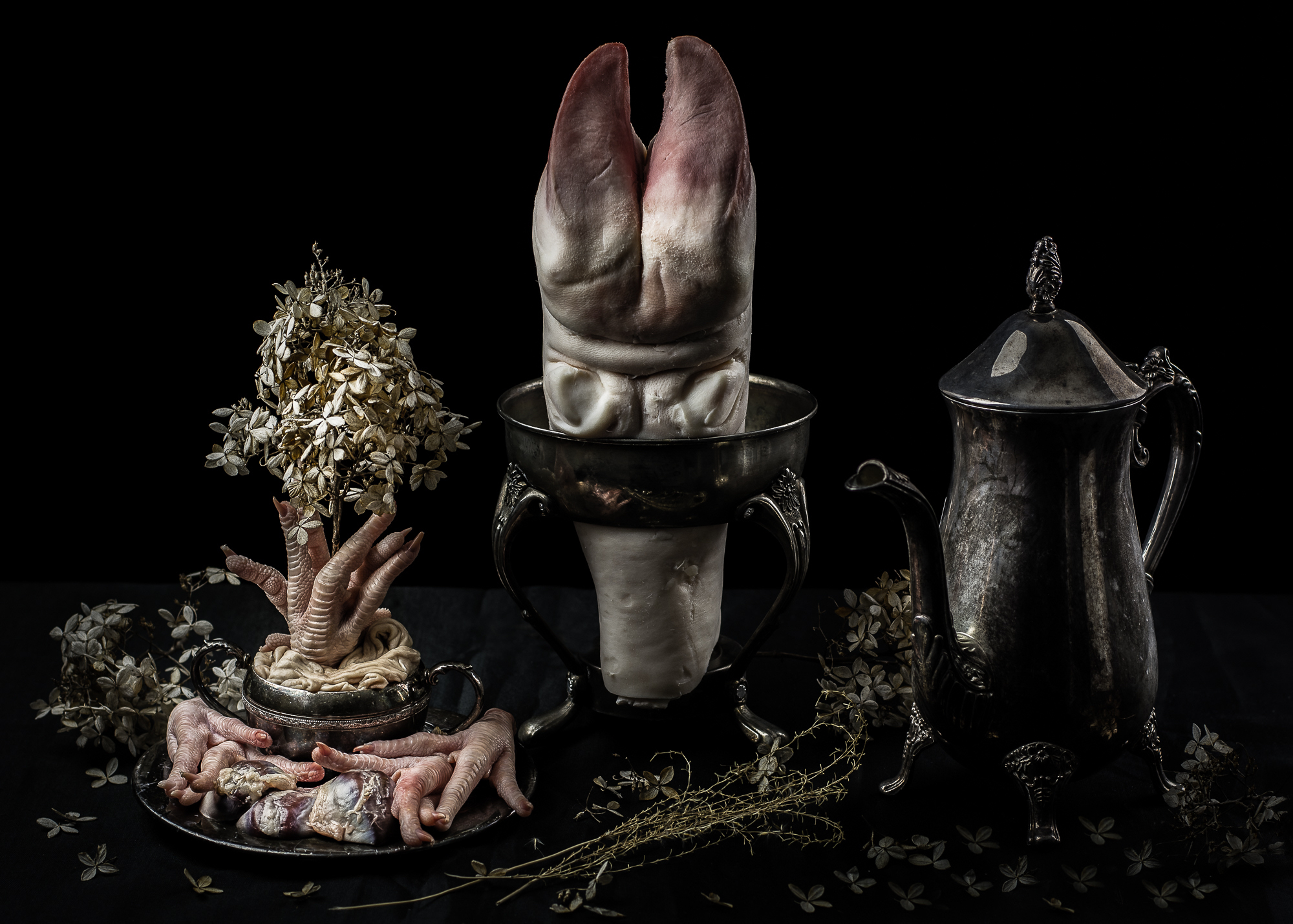 Cow foot, chicken feet, pig intestines, duck gizzards, and dead flowers