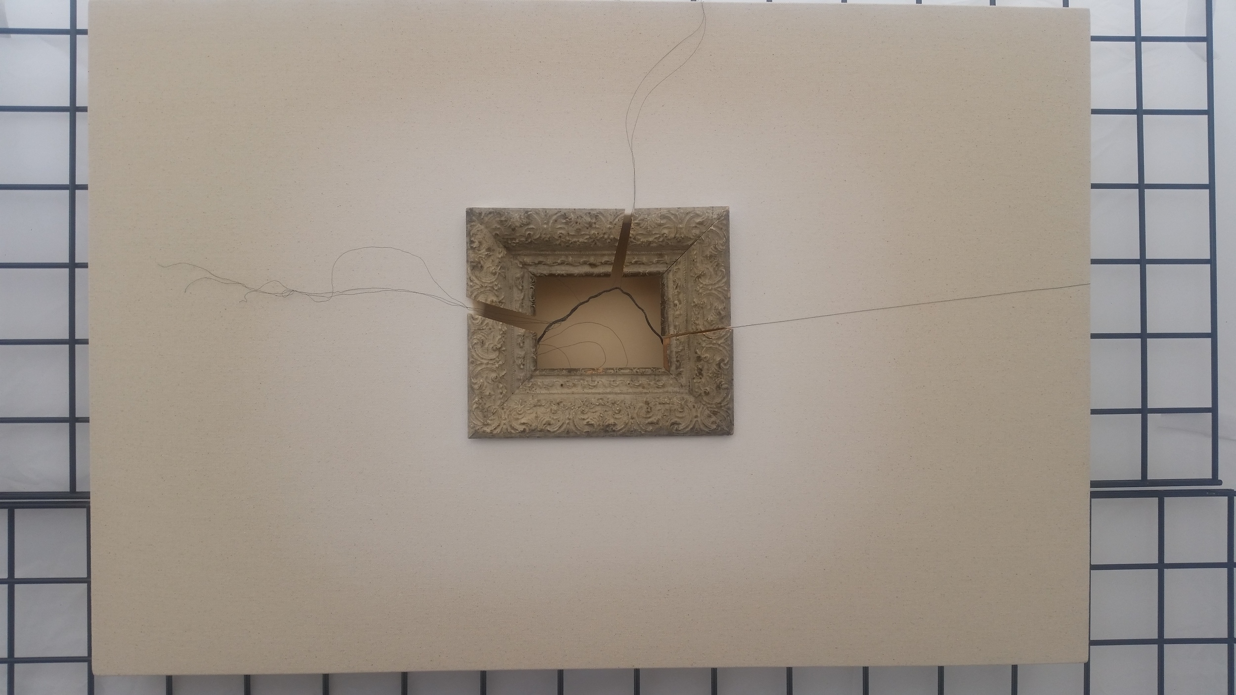 Art by Doris Purchase. This work exposes the unseen, raw elements of a painting (the frame, the wire, the plain canvas)