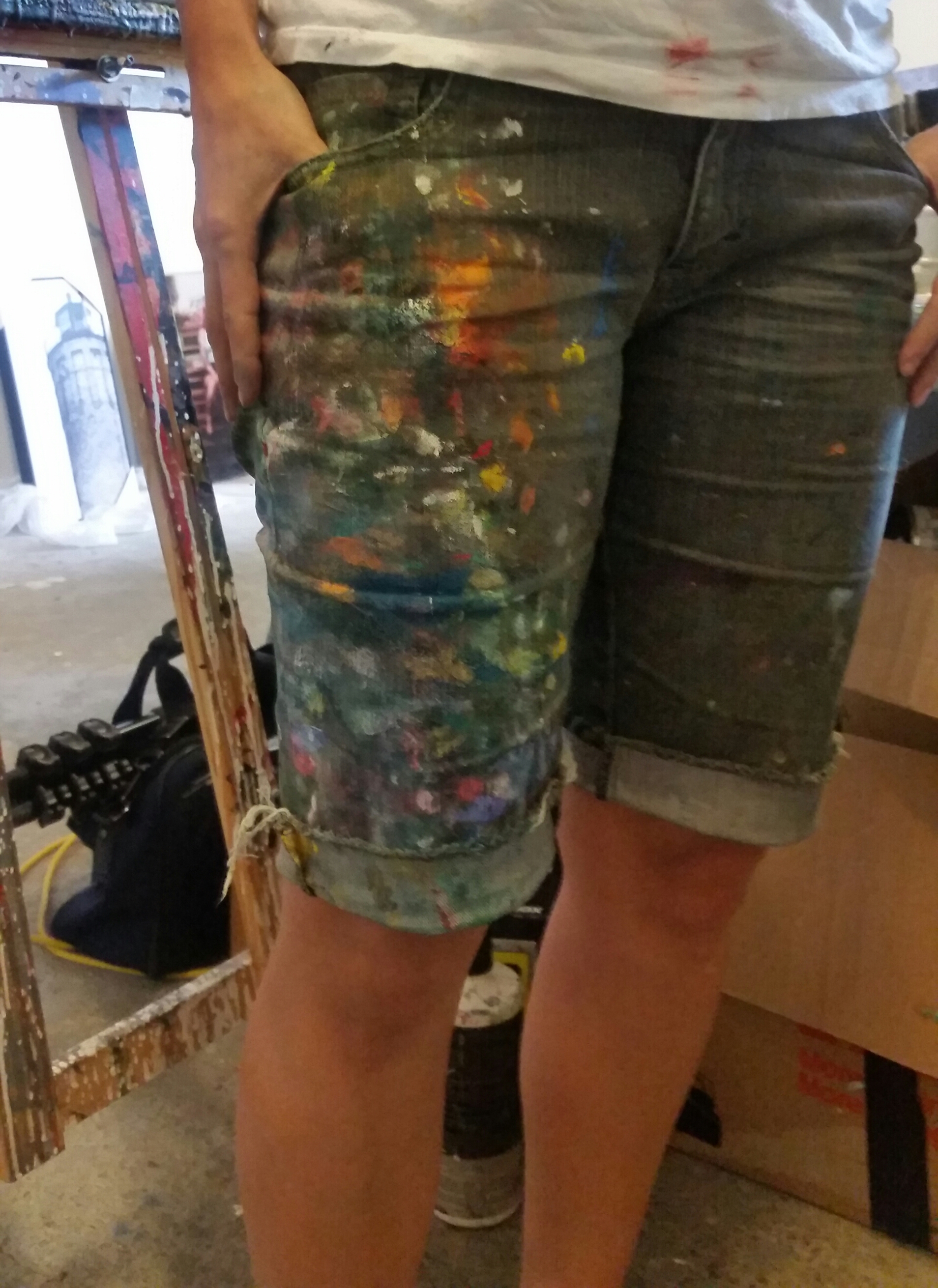 Artist at work. Creativity can be messy...and colourful.