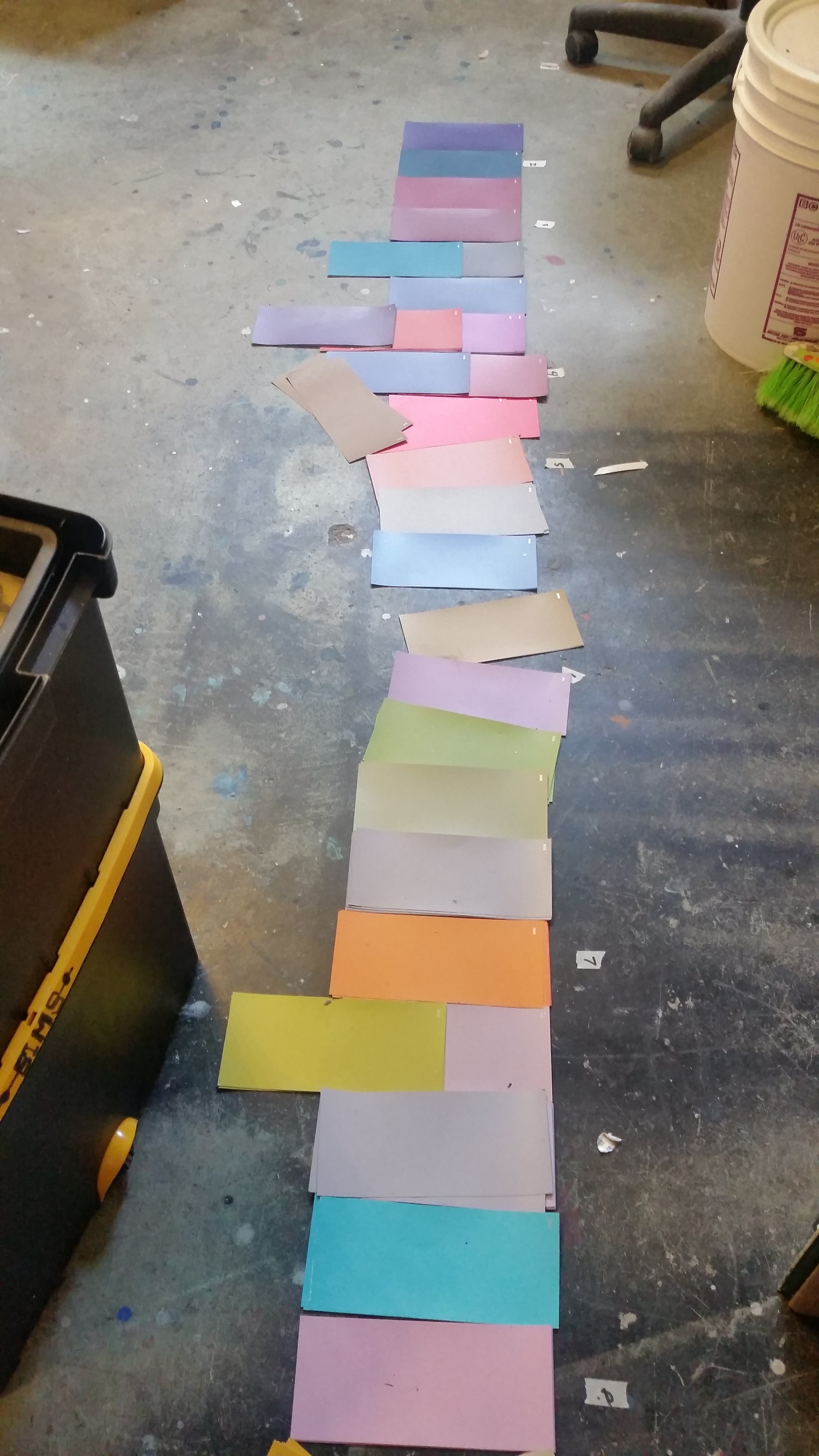 Paint chips on the studio floor.