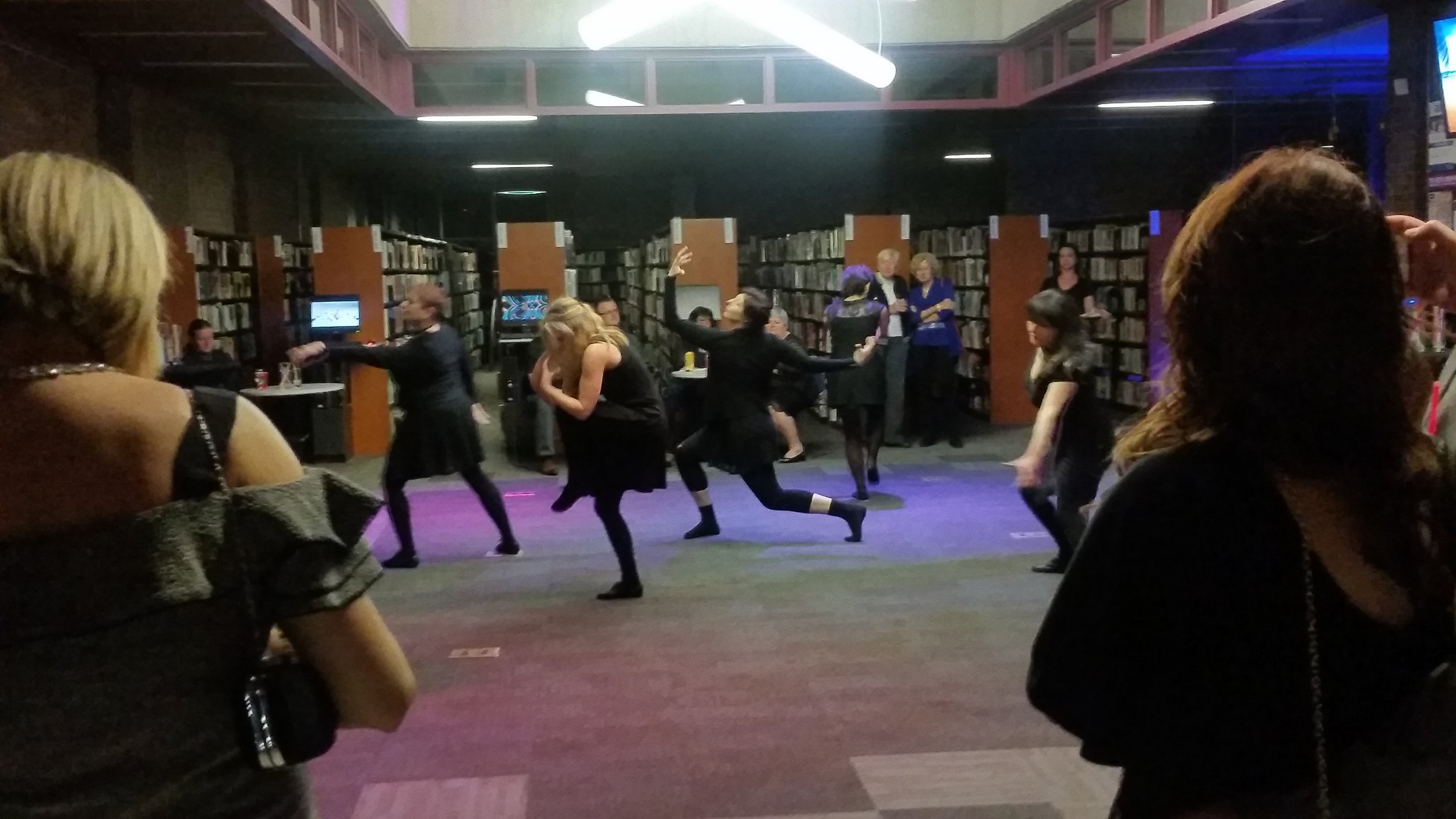 Bodies in motion on the main floor. One of the dance troupes performing.