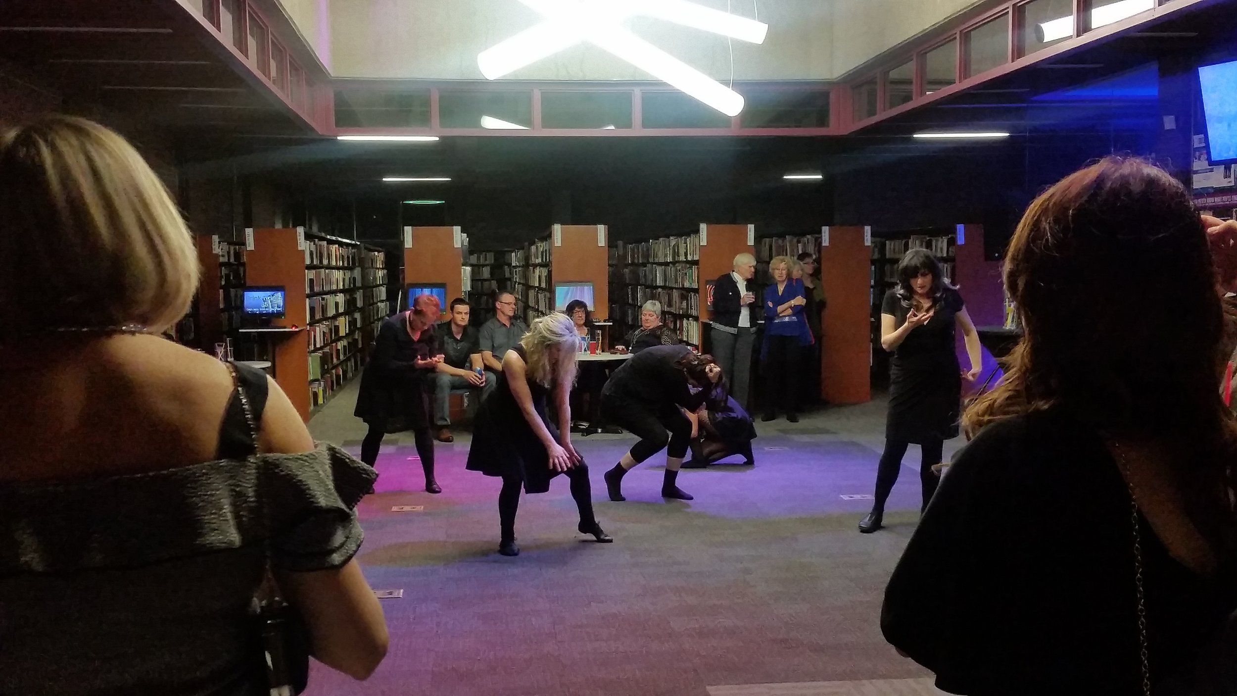 Bodies in motion on the main floor. One of the dance troupes performing.