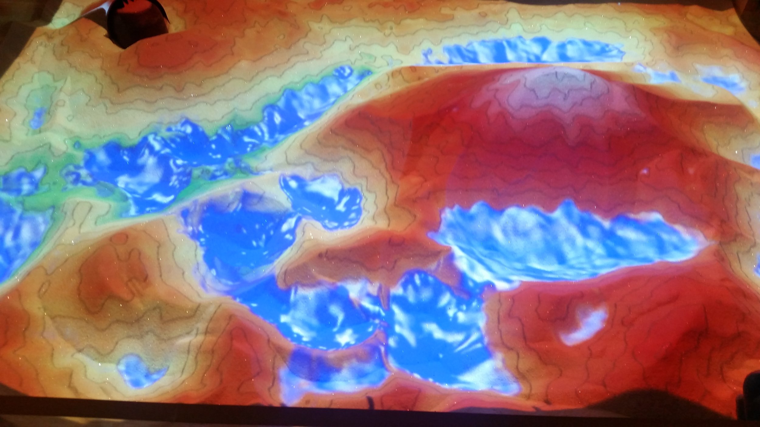 "Augmented Topography" , an interactive sandbox by Shadi Ramos