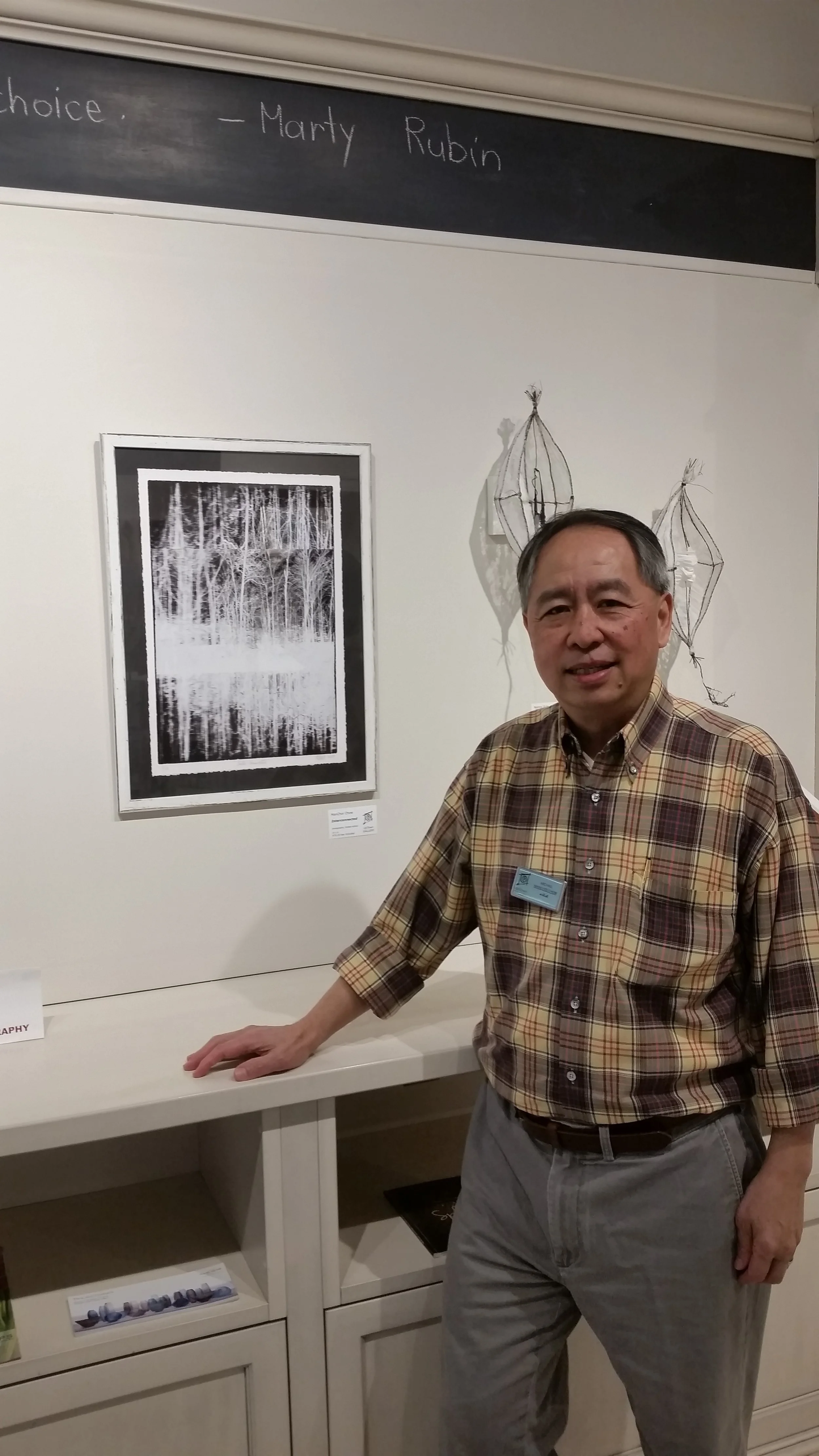 ManChoi Chow at UpTown Gallery with his work "Interconnected"