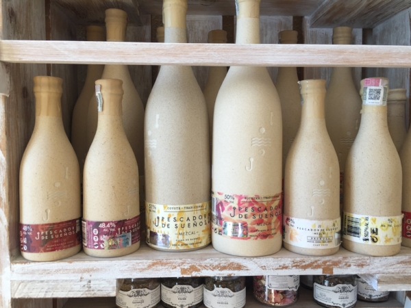 An entire wall of mezcal at a specialty store in Todos, but these bottles stood out. They were made from clay and the mezcal was exceptional as well. 