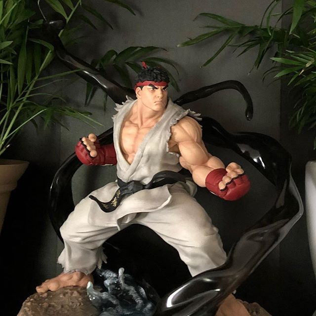 Ryu using his v-trigger. This is a premium collectible from @pcstoys He&rsquo;s pretty heavy and definitely an upgrade from the little Funko Pop! . . .  #ryu #popculture #pcstoys #collectibles #gamer #sfv #streetfighter #specialmove #legendary