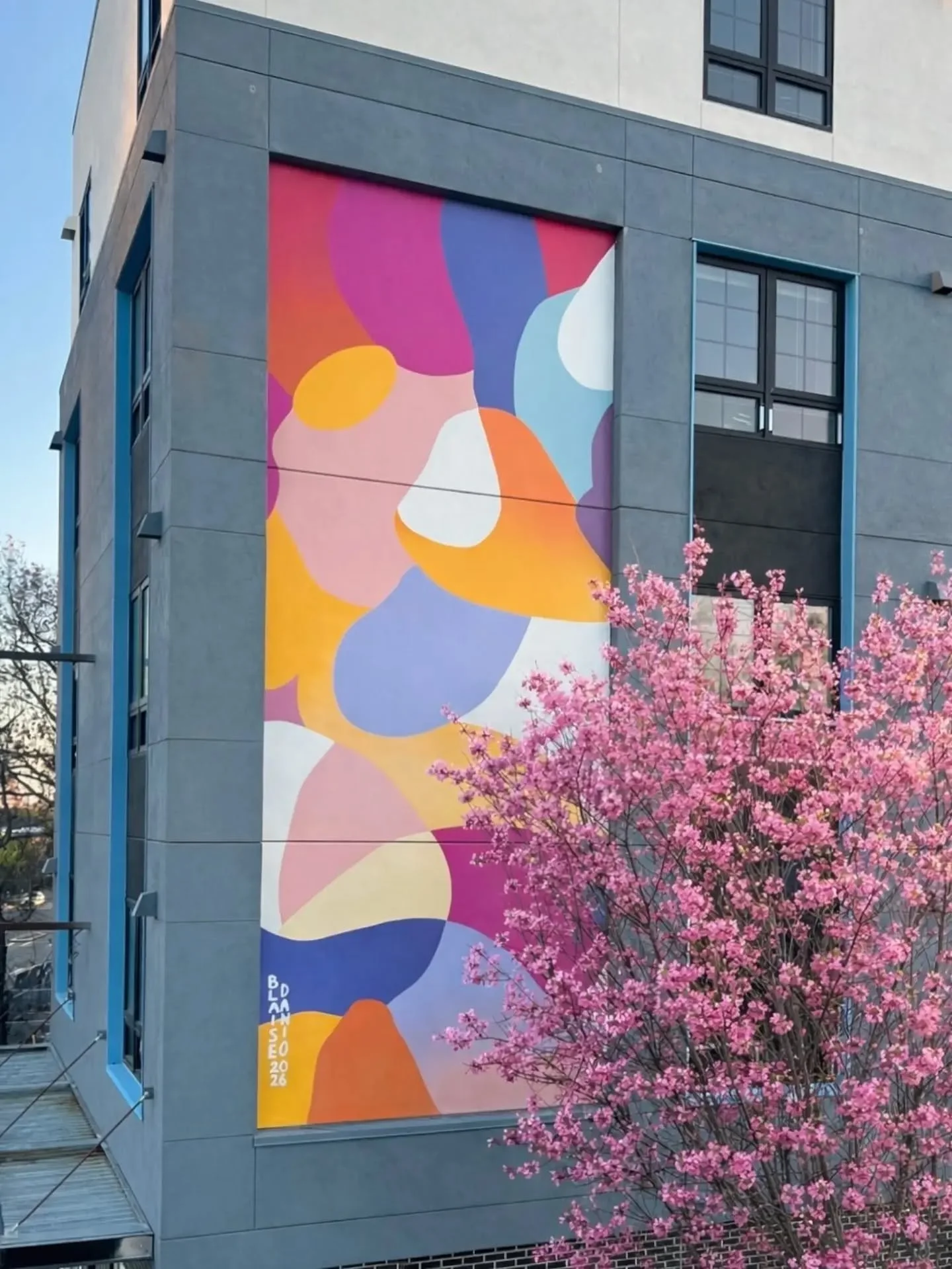 One of the joys of public art is finding something beautiful when you least expect it.

Because beauty can show up anywhere: in a burst of spring color, a flowering tree, or a mural on your walk home. A moment that catches your eye and changes the rh
