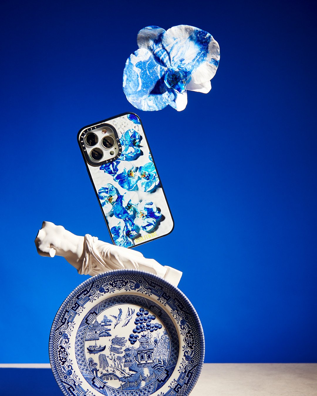 ACID.FLWRS-x-Casetify-shot-by-Mark-Sherborne-delft-blue-flowers-iphone.jpg