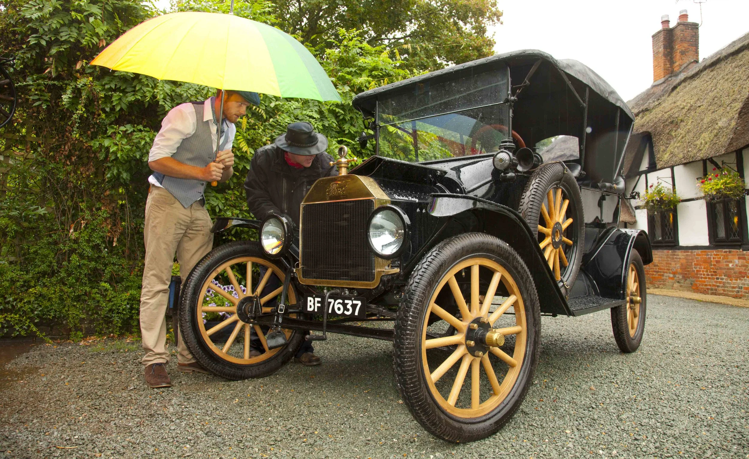 The ‘T is far from conventional behind the wheel so Matt Tomkins’ plan was to use the gentle, slow routes around the New Forest for driving lessons from friend of PC and ‘T’ owner Richard Skinner. Where do we start though? The two speed epicyclic gearbox ‘clutch’ is controlled from the left foot pedal. The handbrake lever to its left holds the pedal half way down its travel. A little bit of hand-throttle and push down of the clutch sees the car lurch forward into first gear. Letting the handbrake off allows the clutch to come back through neutral all the way up into top gear and up to 45mph. When you want to stop, it’s down into first to slow the car with engine braking then raising the clutch back to the half way point – neutral – and a hard push on the right foot pedal which (allegedly) applies the foot brake (which lives, usefully, in a bath of oil within the gearbox). Opposite the hand throttle sits another lever – advance/retard – and between the clutch and brake pedal sits the reverse pedal which should only be pressed with the forward gear clutch either held on the handbrake or carefully balanced in neutral with your left foot. That’s a lot to remember when out on forest roads with – as it turns out – crazy horses and mad tourists to avoid. Find out what happened in the new issue of Practical Classics!
