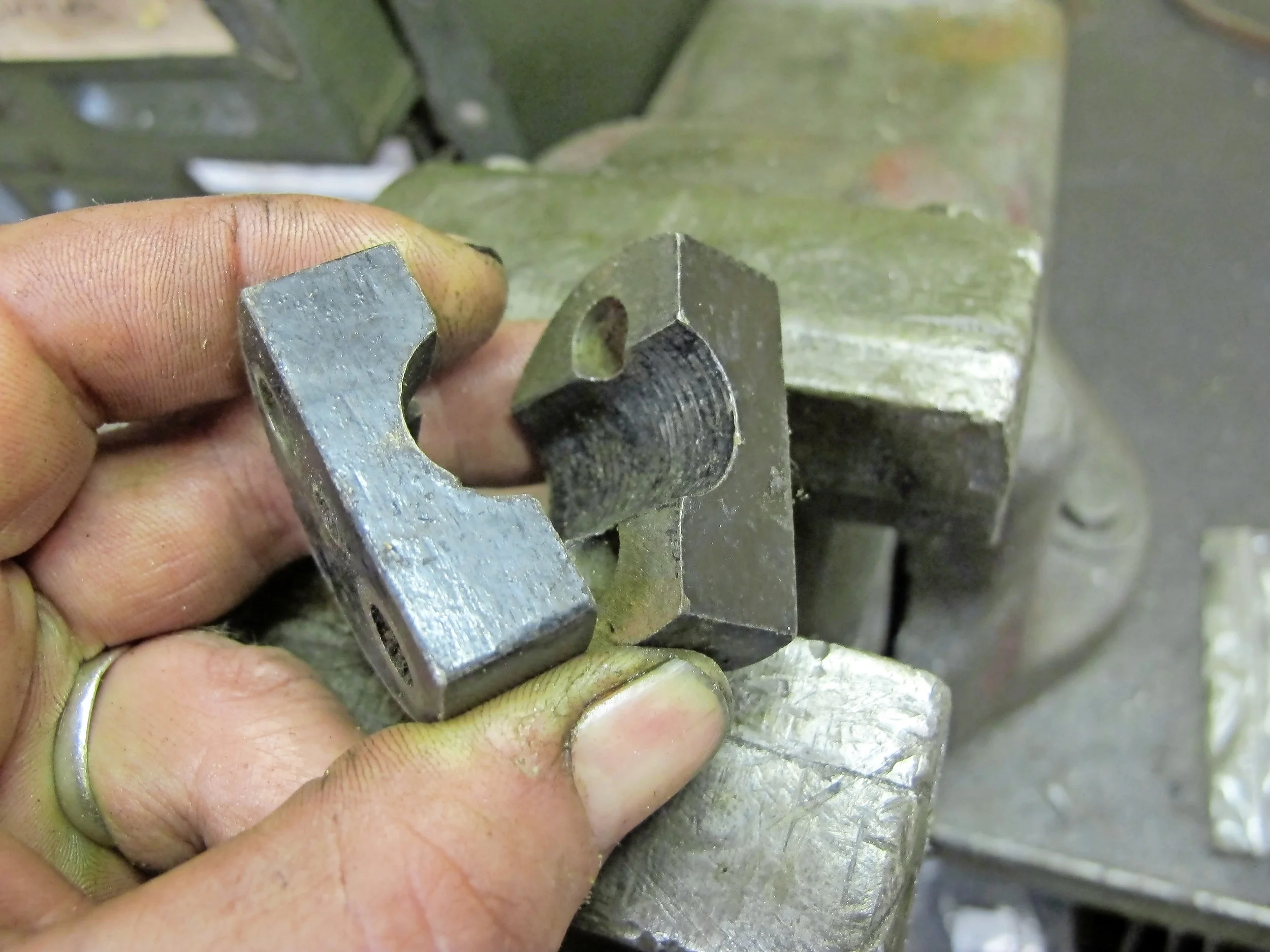 How can using axle clamps in the vice reduce the rattle on a Triumph front brake? read on...
