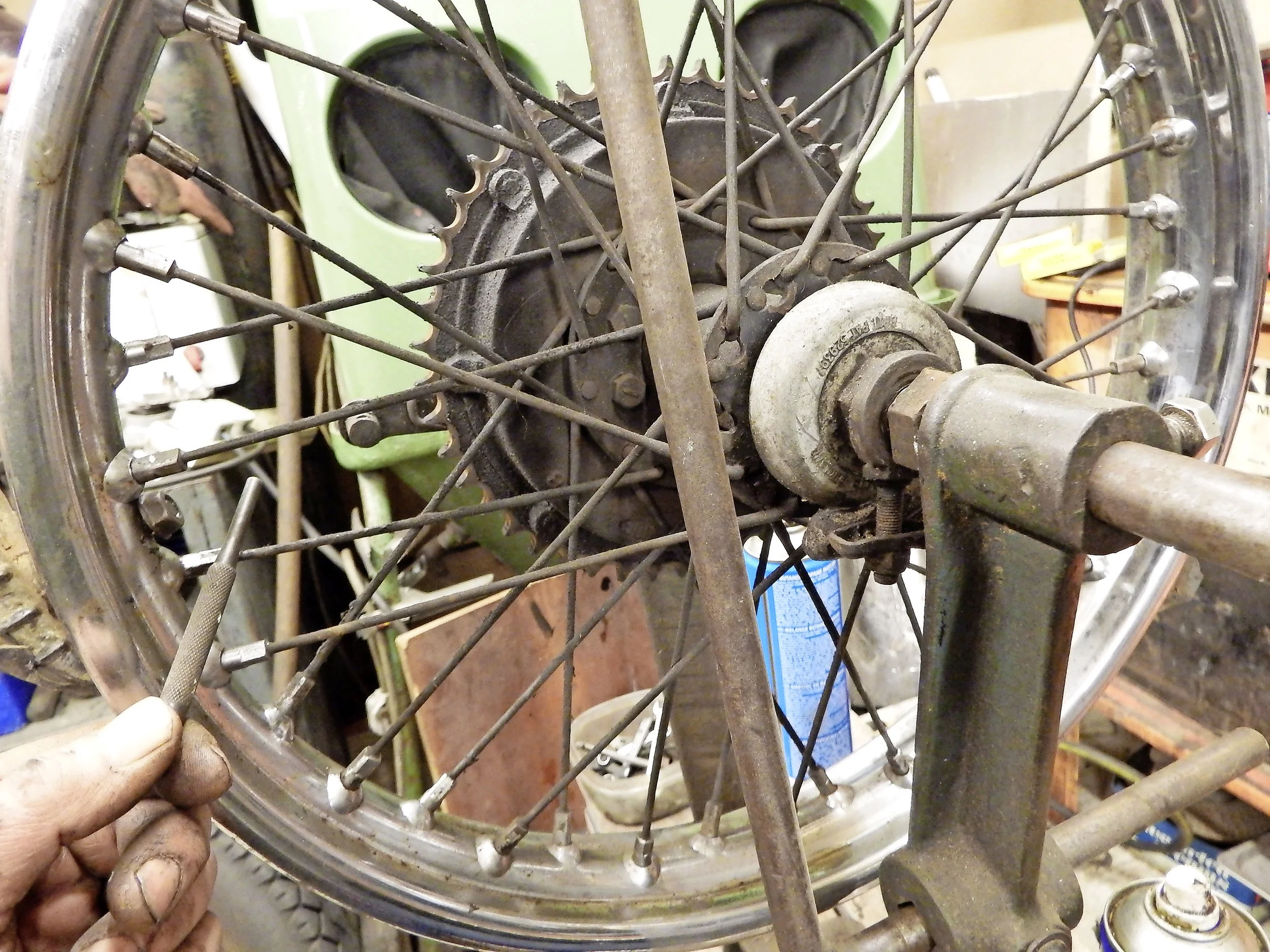 1. You should get a ‘ping’ note from a correctly tensioned spoke. Rattling or a flat noise indicates the spoke has lost some of its tension, increasing the strain on its neighbours.
