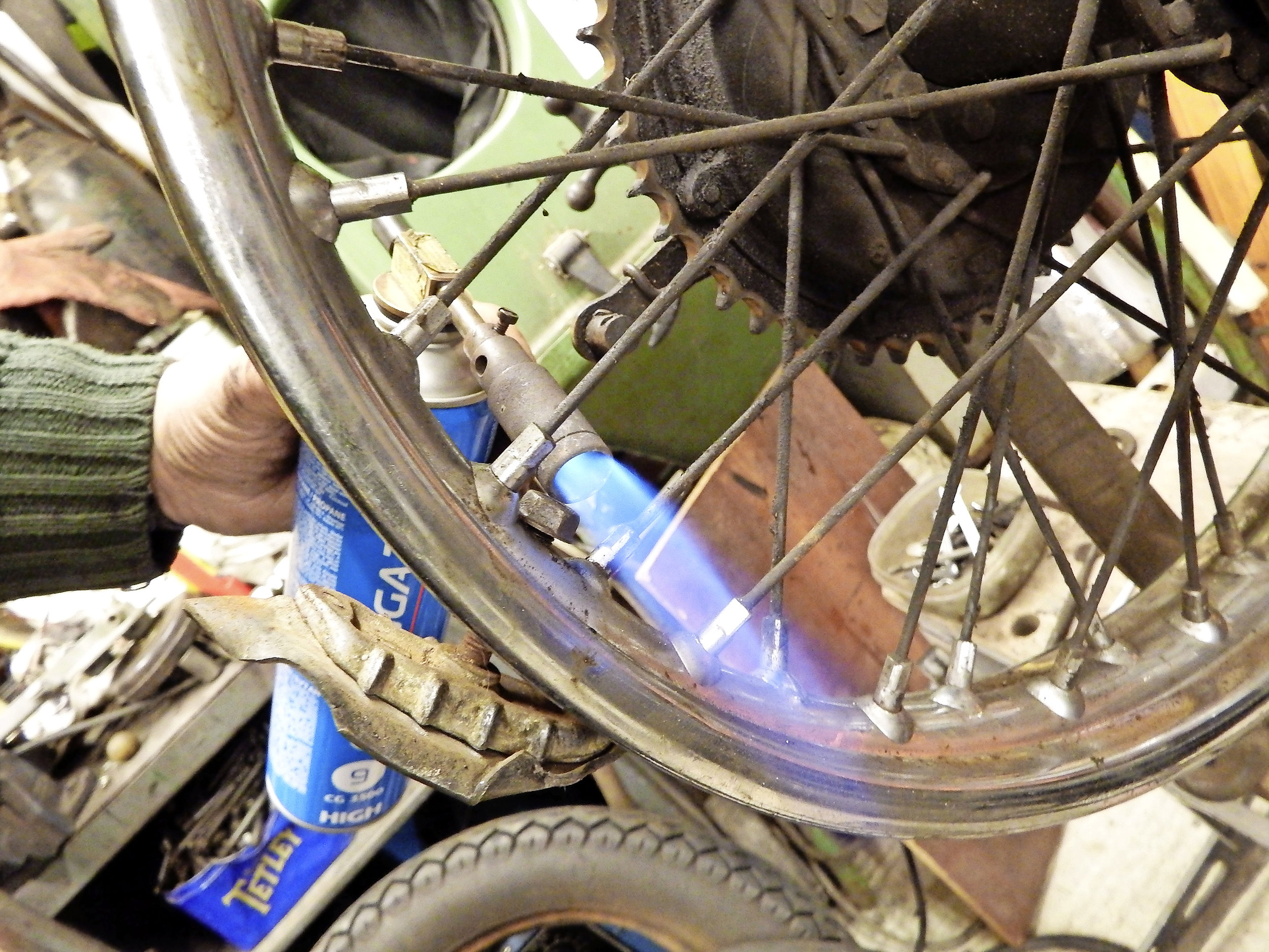 2. Tightening may cause the sharp spoke end to poke out of the nipple, so remove the tyre. If nipple won’t move freely don’t force it – breakage is a much bigger problem. Use heat.
