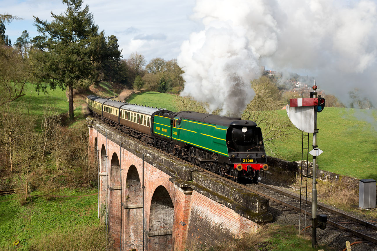 In unfamiliar surroundings, visiting ‘Battle of Britain’ No. 34081 92 Squadron crosses Oldbury Viaduct on the Severn Valley Railway with a rake of Collett stock on March 20 for a Battle of Britain Locomotive Society photo charter. IAN BOWSKILL