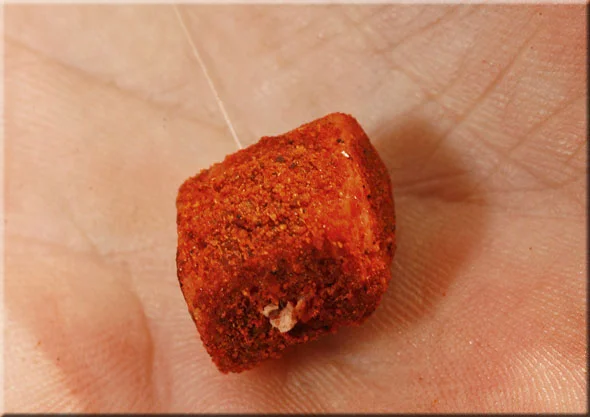 9. To finish, turn the hook 90 degrees and press into the cube