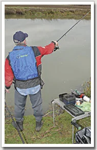 2. Lift the rod up and away from the float to gather the excess line causing the bow