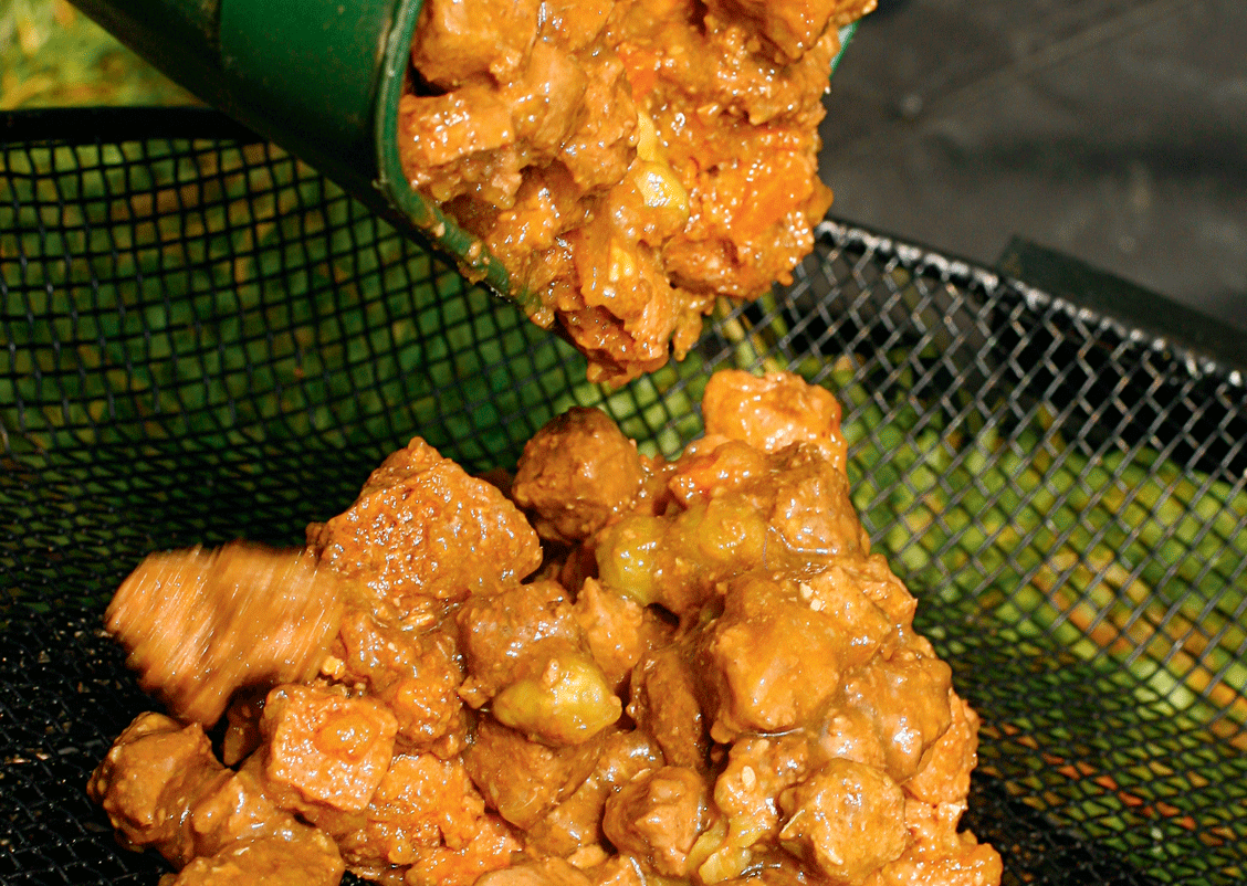 STEP ONE Empty a whole tin of catmeat on to a fine mesh riddle.