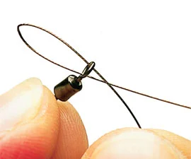 2. Bend an inch of wire and pass the formed loop through the eye of your swivel.