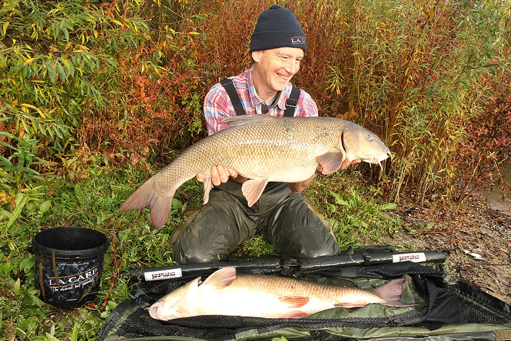 John and his pair of huge Thames barbel.