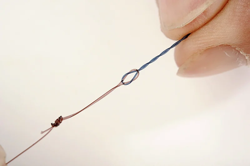 The loop-to-loop forms like this - you may need to flick the hooklength over its own loop knot to achieve this perfect connection. Pull tight. 