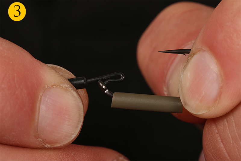 Attach the hook to a size 12 Kwik Lok Flexi Ring swivel.