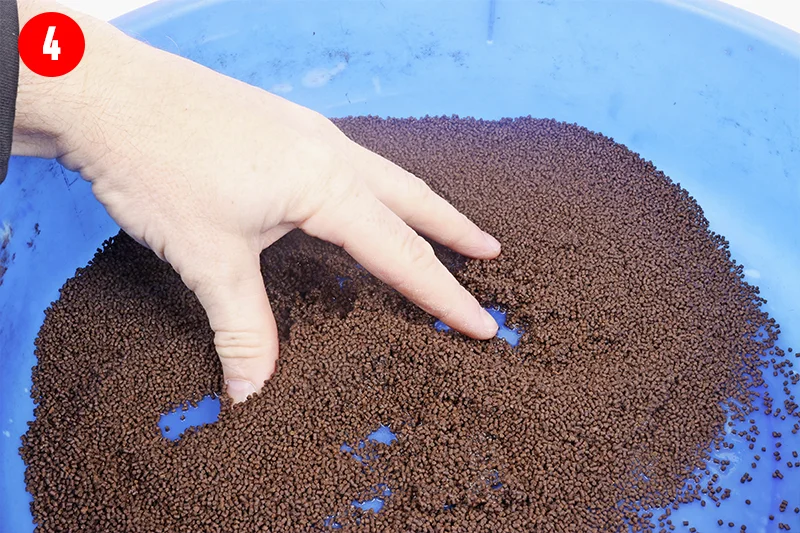 Carefully add a little more water until the pellets are quite tacky but are still absorbing water.
