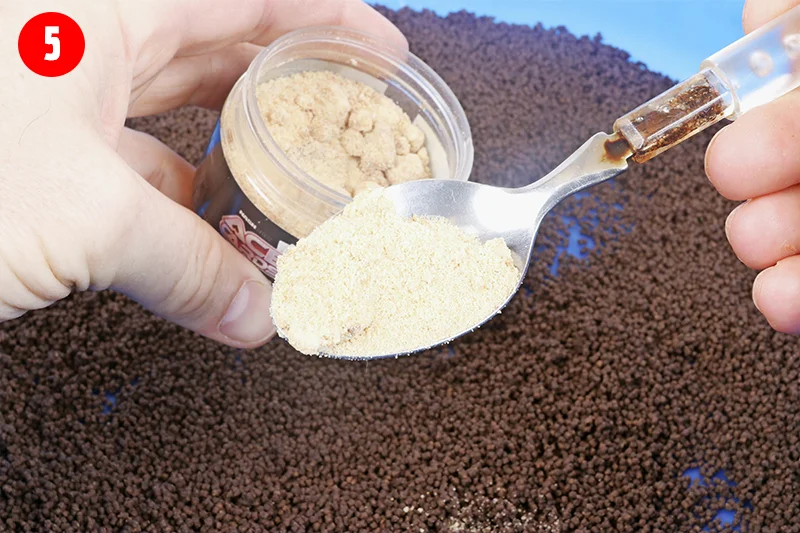 Sprinkle a teaspoonful of rock salt over the pellets to give them an extra boost.