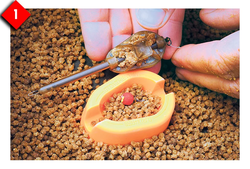 Load the base of the hopper with pellets, then the hoookbait